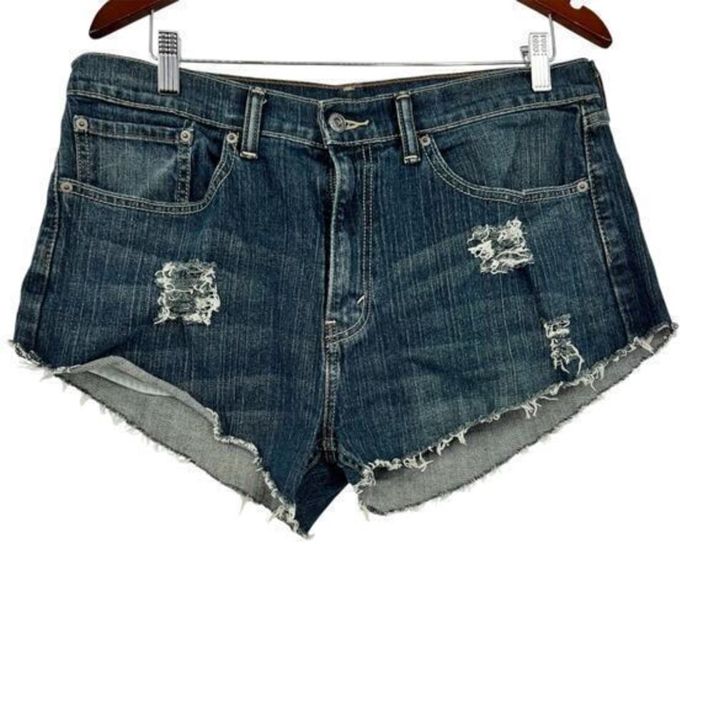 Levi's distressed cut off upcycled hand cut dark jean shorts raw hem size 34
